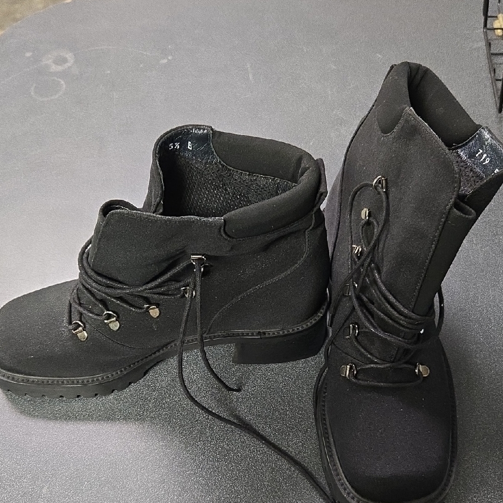 Stuart Weitzman Black Combat Boots with Lace-Up Design